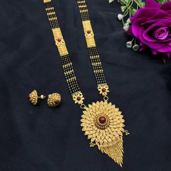 Gold necklace and earrings